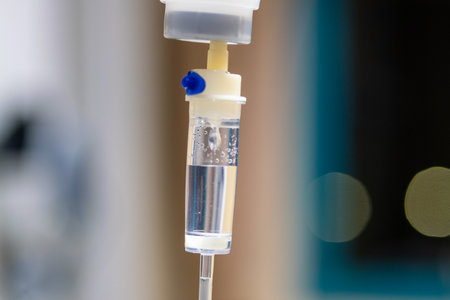 Healthcare action iv fluid administration in hospital setting with clinical focus