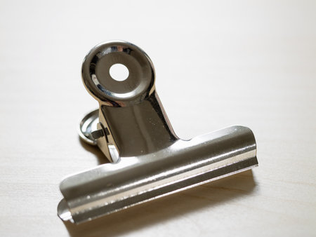 Utility design of a modern metal clipboard in a minimalist office environmentの写真素材