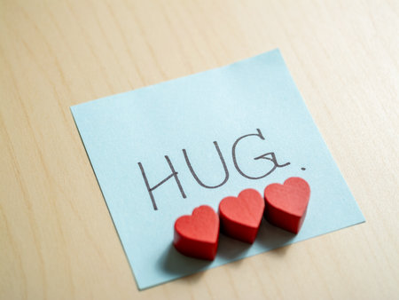 Heartfelt message on sticky note home office close-up intimate love connectionの写真素材