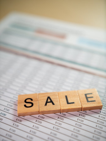 Business sale announcement financial documents office environment close-up view for sales strategy