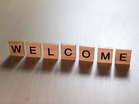 A creative display of wooden blocks spelling WELCOME enhances any indoor setting.の写真素材