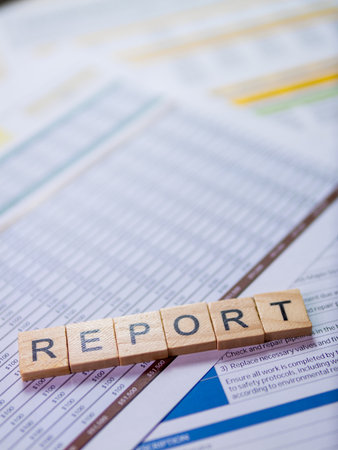 An in-depth look at a business report showcasing data analysis and insights in a professional office setting.の写真素材