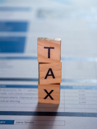 Explore the essential steps of tax filing in a professional office setting focusing accuracy and organization.の写真素材