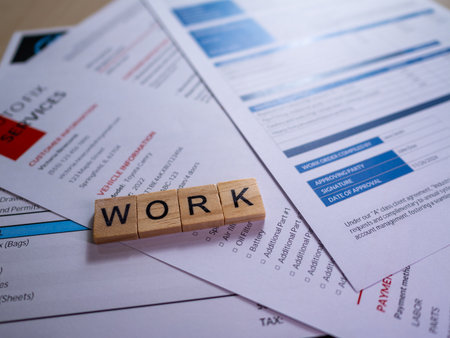 A collection of work-related documents and resumes a desk symbolizing job search and career growth.の写真素材