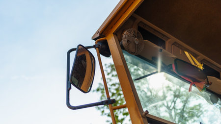 Showcasing the intricate details of heavy machinery in action at a bustling construction site.