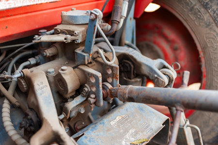 Exploring the intricate components of rural heavy machinery in action highlighting engineering and functionality.の写真素材