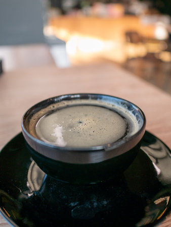 Experience the enchanting coffee brewing process capturing rich textures and soothing steam.の写真素材