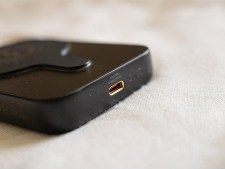 Exploring a sleek charger design that enhances modern workspaces with its minimalist style.