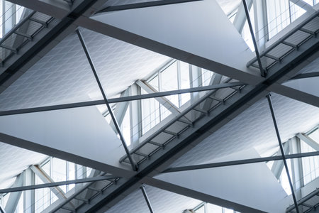 Explore the intricate design of a modern ceiling showcasing architectural elegance.