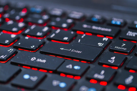A detailed look at the keyboard's Enter key revealing its intricate design and technology.の写真素材