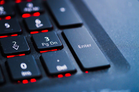 Explore the modern design and functionality of a laptop keyboard focusing on key features.