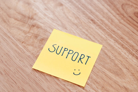 A simple note of support promotes positivity in the workplace fostering a friendly environment.