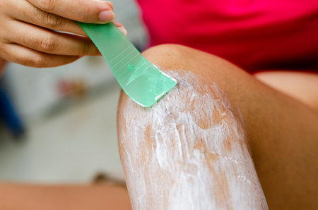 A detailed view of a DIY hair removal process highlighting personal care and grooming.
