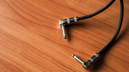 Explore the intricate setup of audio cables in a home studio environment.の写真素材