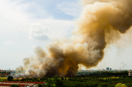 A fire ignites in an urban area producing thick smoke that raises alarms about environmental safety.