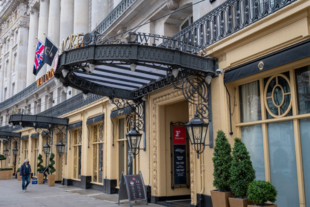 London. UK.10.08.2020. The entrance and facade of the Waldorf Hotel in Aldwych, Westminster.のeditorial素材