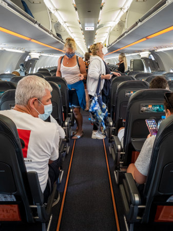 Gatwick Airport. UK. 07.18.2020. Air passengers boarding a airplane during Covid-19 pandemic.のeditorial素材