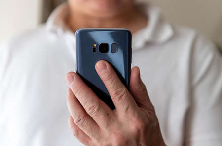 A person using a smart phone.の写真素材