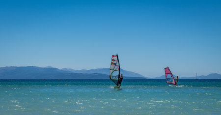 Lefkada island.Greece.07.23.2020. Tourists enjoying and learning wind surfing on their summer vacation.のeditorial素材