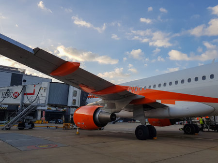 06.15.2017. Sussex. UK. A EasyJet plane  in Gatwick Airport waiting for boarding passengers.のeditorial素材