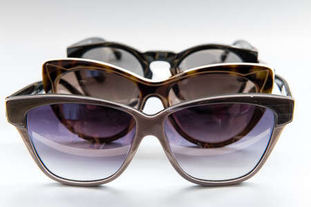 Designer sun glasses isolated with a white background.の写真素材