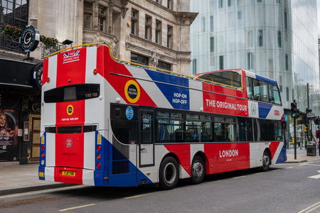 London. UK. 05.03.2021. A empty tour bus by the Swiss Centre waiting for customers for a road tour of the capital's sights.のeditorial素材