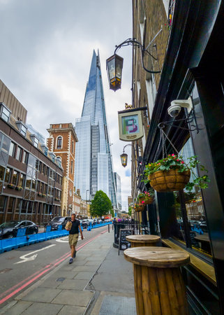 London. UK- 06.10. 2021. A cityscape with a street view of The Shard in Southwark.のeditorial素材