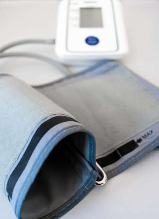 A blood pressure monitor isolated with a white background.の写真素材