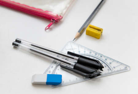 Children's school equipments isolated on a white background.