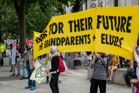 London. UK- 06.27.2021. A Free The Press protest in Parliament Square hosted by Extinction Rebellion UK attended by a large crowd of activists.のeditorial素材