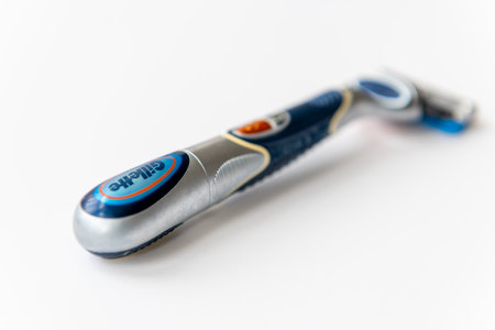 London. UK- 07.07.2021. A Gillette battery powered safety razor for shaving.