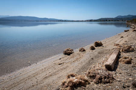 The salt lake by the channel to Lefkada island. Greece. A popular summer holiday destination.
