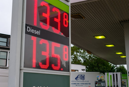 London. UK. 02.10.2021. Fuel price display in a petrol forecourt with the cost hitting a five year high due to high global demand for fuel.のeditorial素材
