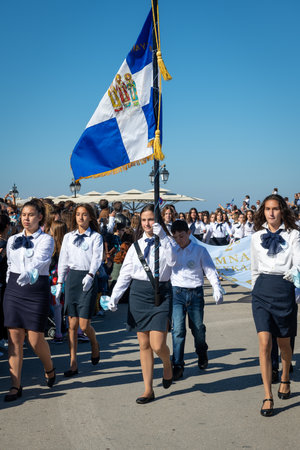 Lefkada. Greece. 10.28.2021. School children marching on the Greek Oxi Day anniversary celebration parade.のeditorial素材