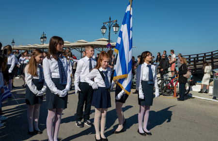 Lefkada. Greece. 10.28.2021. School children waiting to start their march on the Greek Oxi Day anniversary celebration parade.のeditorial素材