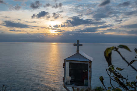 A cloudy sunset over the sea.の写真素材
