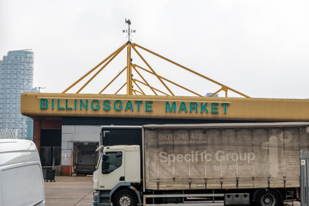 London. UK-03.30.2022. Exterior view of the building of Billingsgate fish Market showing the name...