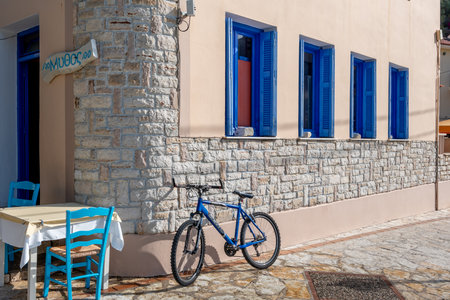 Ithaca Island, Greece-05.25.2022. A restaurant by the seafront of Kioni catering for tourists.のeditorial素材