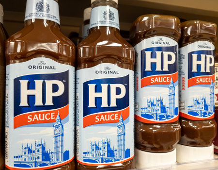 London. UK- 01.27.2023. Bottles of HP Sauce on display on the shelf of a grocery store.のeditorial素材