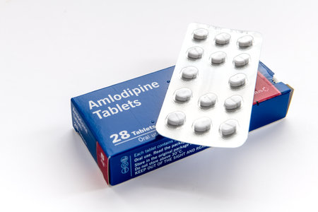 London. UK- 01.29.2023. A packet of Amlodipine tablets isolated in white. Medicine for the control of hypertension, high blood pressure.のeditorial素材