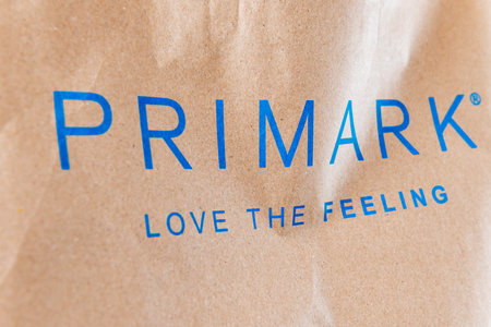 London. UK- 02.19.2023. The name of the popular fast fashion store Primark and its slogan as printed on its shopping bag.のeditorial素材