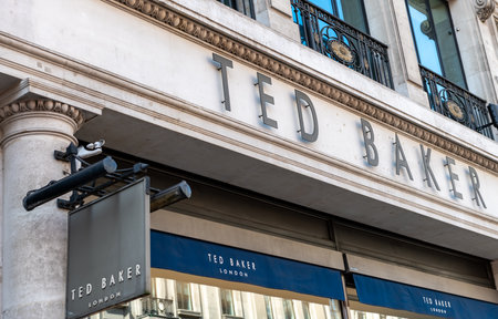 London. UK- 04.09.2023. The Ted Baker name sign on the facade of its retail branch in Regent Street.のeditorial素材