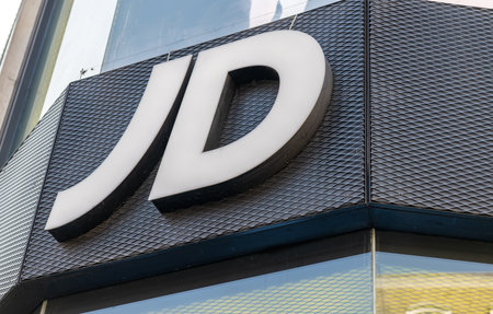 London. UK- 04.09.2023. The name sign on the facade of a JD Sports store on Oxford Street. A leading trainers and sports fashion retailer Britain.のeditorial素材