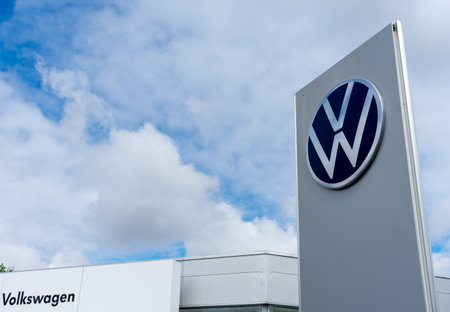 London. UK- 05.01.2023. The Volkswagen name sign on the forecourt of a VW car dealer.のeditorial素材