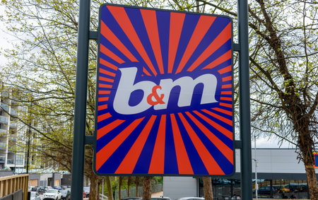 London. UK- 05.01.2023. The name sign and logo of a branch of B and M store which sell a selection...