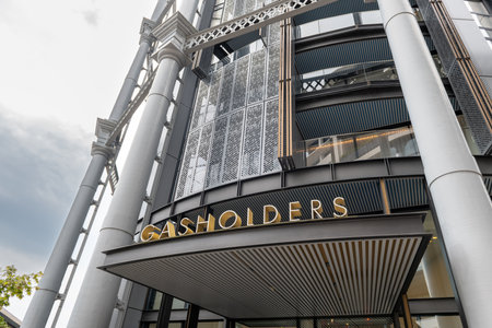 London. UK- 05.04.2023. The facade and name sign of the Gasholders 12 building in King's Cross.のeditorial素材