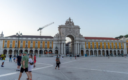 Lisbon. Portugal- 07.08.2023. Tourists and visitors at the Praca do Comericio or Commerce Plaza.のeditorial素材