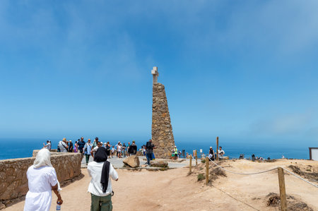 Cape Roca. Portugal- 07.08.2023. Visitor and tourists at the monument marking the most wester point of continental Europe.のeditorial素材
