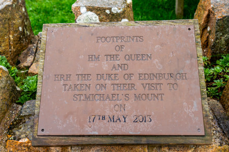 St. Micheal's Mount. Cornwall. UK-10.02.2023. A sign commemorating the late Queen Elizabeth and the Duke of Edinburgh's visit.のeditorial素材
