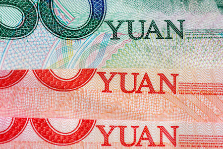Macro close up of the word Yuan on bank notes, the currency of The People's Republic Of China.